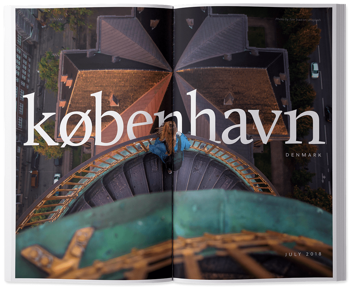 Image of booklet inner title spread showing a young girl looking down towards the roof of a steeple with the word Kobenhavn overlayed on the image